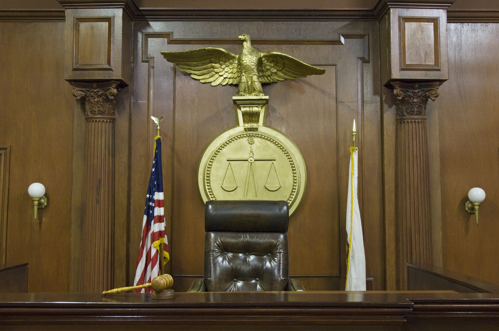 Empty courtroom with chair of judge